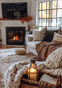 a living room filled with furniture and a fire place