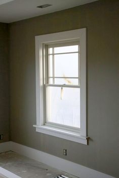 a bathroom with a sink and window in it