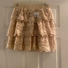 Cute Skirt With Elastic Waist Casual Lace Tiered Skirt Bottoms, Casual Lace Mini Skirt For Summer, Summer Casual Lace Mini Skirt, Casual Flowy Lace Skirt, Casual Lace Flowy Skirt, Lace Lined Skirt For Day Out, Day Out Lace Tiered Skirt, Spring Lace Tiered Mini Skirt, Lace Tiered Skirt For Day Out