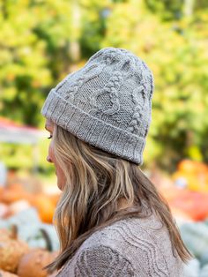 A warm cap to knit in three sizes (S/M/L) that will be much appreciated by any family member when the cold winds blow. Simple cable crosses in a vertical pattern create a neat, modern motif that is engaging to knit and delicious to wear. Knit in a round tightly twisted yarn for crisp stitch definition and a snug fit; for a softer texture and fit, work in a relaxed yarn or fiber blend. May be worked with a shorter, single brim (instructions included). Samples shown are size M (hers) and size L (h