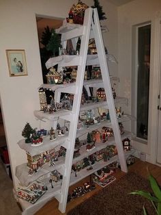 a christmas tree made out of white shelves