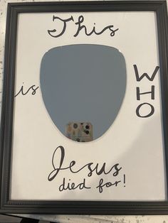 a framed photo with the words who is jesus died for and a dice in it