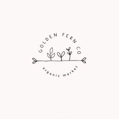 the golden fern organic market logo is shown in black and white, with an arrow pointing up