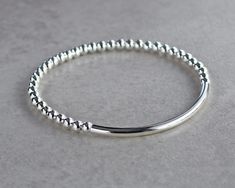 Minimalist Silver Stretch Bracelet | Etsy Cheap Sterling Silver Bangle Jewelry, Cheap Silver Metal Beaded Jewelry, Cute Cheap Silver Beaded Bracelets, Cheap Metal Beaded Bracelets For Everyday, Cheap Casual Bracelets With Adjustable Band, Cheap White Band Bracelets, Affordable Hypoallergenic Silver Jewelry, Cheap Casual Band Bracelets, Affordable Silver Metal Beads Jewelry