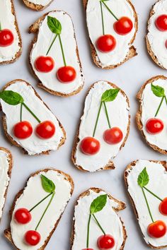 cherry tomatoes and cream cheese on toasted bread with text overlay reading easy to make cherry tomato summer appetizer