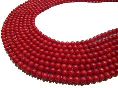 Beautiful Red Coral Round Shape Beads Plain Smooth Ball Shape Red Coral Beads Size 6-7mm Sold per Strand 15-16 inch Long Wholesale Price Precious Stones Size : 6-7mm Color: Red Shape : Round These are top Quality Gemstone Beads . Measurements and weight are close approximations. Great Quality for making Necklace, earrings, Bracelet or any other jewelry. The photographs of the items have been taken in natural daylight, without any enhancements or affects and all attempts have been made to depict Red Rondelle Beaded Necklace With Spacer Beads, Red Coral Beaded Necklaces With Spacer Beads, Red Rondelle Beads For Gifts, Red Rondelle Beads For Gift, Red Coral Spacer Beads, Round Shape, Red Rondelle Gemstone Beads, Red Coral Round Spacer Beads, Red Coral Spacer Beads, Hand-strung Red Beads For Jewelry Making