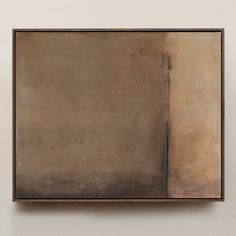 an abstract painting hanging on the wall