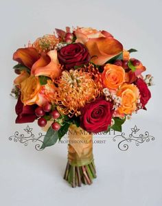 an orange and red bouquet on a white background