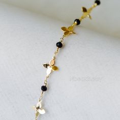 Size: flower width 11mm / black crystal rondelle size 4mm Color: polished shiny gold Material: real gold plated on brass, Chinese crystal beads Quantity: 1 meter=3.3 feet approx. Others: high quality, handmade, color not easily tarnish Tips: you can cut the chain into pieces, use as charm/ connectors ❤ See more quality chains here: ❤ https://www.etsy.com/shop/Nbeads?search_query=LK ❤ See more metal supplies here: ❤ https://www.etsy.com/shop/Nbeads?search_query=GB Gold Beaded Chain Flower Jewelry, Gold Flower Beaded Chain Jewelry, Gold Flower Shaped Beaded Chain Jewelry, Gold Flower-shaped Beaded Chain Jewelry, Rainbow Crystal, Crystal Chain, Black Crystals, Real Gold, Gold Material