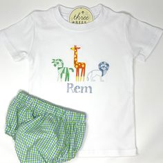 Our Zoo Trio Boys Embroidery T-shirt is perfect for your animal loving little boy. Add a name for personalization. Cute T-shirt With Machine Embroidery And Short Sleeves, Playful Embroidered Short Sleeve Tops, Cute Machine Embroidered Short Sleeve T-shirt, Personalized Unisex Short Sleeve T-shirt, Playful Embroidered Cotton T-shirt, Personalized Green Cotton T-shirt, Personalized Green Short Sleeve Tops, Green Short Sleeve T-shirt With Custom Embroidery, Trio Boys