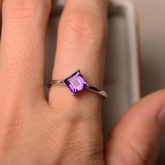 This halo ring features a 6*6mm square cutamethyst and sterling silver finished with rhodium. Customization is available. It is made by hand, and it will take about 7 days to finish the ring after your payment is completed. Main stone: natural amethyst Amethyst weight: Approx 1.25 ct Metal type: sterling silver finished with rhodium Customization is available, I also can make it with 14k solid gold (white or yellow or rose), just feel free to contact me. Any question, just let me know. :) My sho Square Cut Rings, Cocktail Party Decor, Silver Wedding Rings, Personalized Rings, February Birth Stone, Dainty Jewelry, Amethyst Ring, Ring For Women, 925 Sterling Silver Jewelry