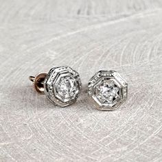 Antique Old European Diamond Earrings 18K Gold Art Deco Engraved Octagonal Design, .26 Ctw, Screw On Backs, GIA G.G. Appraisal Included 790 Usd. These beautiful and unique earrings measure approximately 9mm in diameter and rise 3.7mm from ear. What a unique and lovely set! An independent GIA Graduate Gemologist has performed an appraisal and a copy will be included with your purchase! Here are the specific findings: Ladies' 18 karat yellow and white gold diamond earrings. Each earring contains one center old european cut diamond, bead set, with average estimated weights of .13 ct. each, total diamond weight for the pair of earrings is .26 ct. The diamonds have an average quality of VS clarity and H color with fair proportions and polish. The diamonds are set in octagonal frames with bright Luxury Antique Diamond Earrings With Single Cut Diamonds, Diamond Stud Earrings Antique, White Gold Diamond Earrings, Gold Art Deco, Gold Art, European Cut Diamonds, Vintage Diamond, Hand Engraving, Unique Earrings