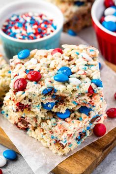 patriotic rice krispy treats stacked on top of each other with red, white and blue sprinkles