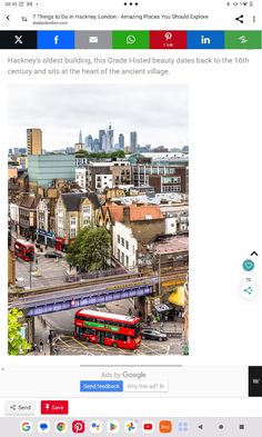 an image of a red double decker bus driving down the street in front of a city