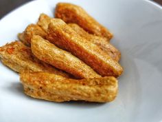 some fried food in a white bowl on a table