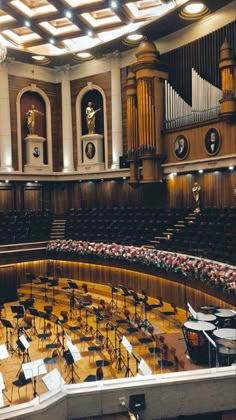 an empty concert hall filled with musical instruments