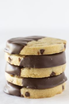 chocolate covered cookies stacked on top of each other