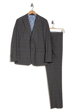 A refined plaid two-button suit cut in a trim silhouette is the perfect go-to for any well-dressed event. 36.4" inseam; 7.8" leg opening; 10.6" rise (size 36) Jacket has peak lapels; chest welt pocket; flap welt pockets
 77% polyester, 21% rayon, 2% spandex Dry clean Imported Model stats: 6'1" height, 32" waist. Model is wearing size 36. Tailored Plaid Suit With Notch Lapel, Fitted Plaid Suit With Welt Pockets, Fitted Plaid Business Suits, Fitted Plaid Suits For Business, Plaid Suits With Notch Lapel And Welt Pockets, Tailored Plaid Suits With Welt Pockets, Fitted Plaid Single Breasted Suit, Fitted Plaid Suit For Semi-formal Occasions, Semi-formal Fitted Plaid Suits