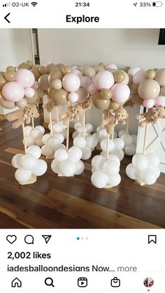 balloons are arranged in the shape of animals on sticks