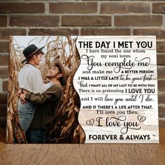 a wooden frame with an image of two people hugging and the words i love you on it