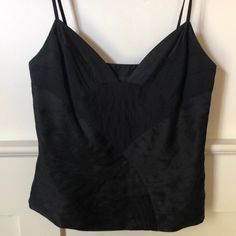 Absolutely Beautiful Tailored Lined Vintage Marc Jacobs Camisole In Black Silk. Featuring A Side Zip And Amazing Stitching Details. Couldn’t Really Find A Good Way To Photograph And Capture Its Beauty But Believe Me, It’s A Classic And Unique Piece You Can Dress Up Or Down. Labeled 8, It’s A Fitted Top Best For A 6-8 Imo. Would Have Been Around 400 New! In Great Vintage Condition, A Little Rumpled From Sitting Unused In My Closet And Ready To Go To A New Home :) Sleeveless Evening Tops With Built-in Bra, Cami Top With Built-in Bra For Evening, Silk Cami Top With Built-in Bra, Black Silk Camisole Top, Silk Camisole Evening Top, Black Silk Sleeveless Tank Top, Black Silk Camisole For Spring, Silk Camisole Top For Evening, Evening Silk Camisole Top