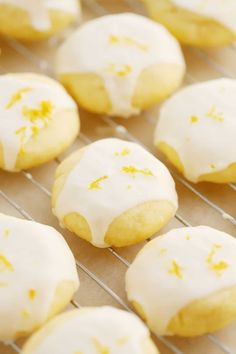 lemon cookies with icing on a cooling rack ready to be baked in the oven