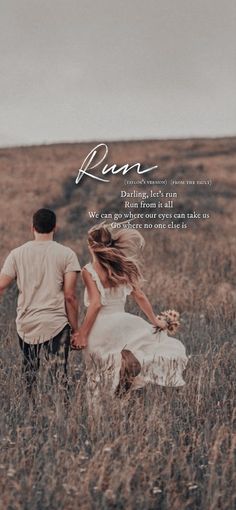 a man and woman walking through a field holding hands with the words run written above them