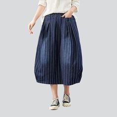 Make a statement in the 2023 Autumn Collection with this striped long women's denim skirt! Turn heads and channel the spirit of the millennium with this Y2K-inspired creation. boasting a high-waisted cut. sanded finish. and rubber closure. A unique blend of vintage and modern. this skirt promises to elevate your look with effortless sophistication.Why You'll Fall In LoveThis skirt is a timeless classic. offering a high-waisted silhouette with a unique. Y2K-inspired charm. Its vertical stripes. s Striped Spring Bottoms With Pockets, Spring Striped Bottoms With Pockets, Baggy Striped Bottoms For Spring, Baggy Cotton Denim Skirt For Spring, Baggy Dark Wash Cotton Skirt, Baggy Cotton Knee-length Skirt, Baggy High-waisted Cotton Skirt, Baggy Knee-length Cotton Skirt, High Waist Baggy Cotton Skirt