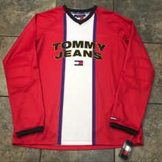 New With Tags Size Xl -All Measurements Are Approximate -Pit To Pit: 23 Inches -Length: 30 Inches Tommy Hilfiger Casual Sports Tops, Tommy Hilfiger Long Sleeve Streetwear Tops, Sporty Long Sleeve Tommy Hilfiger Top, Tommy Hilfiger Sporty Long Sleeve Tops, Sporty Tommy Hilfiger Tops With Graphic Print, Tommy Hilfiger Long Sleeve Casual T-shirt, Casual Long Sleeve T-shirt By Tommy Hilfiger, Casual Long Sleeve Tommy Hilfiger T-shirt, Ferrari Tshirt