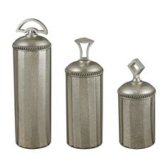 three silver canisters with handles on each side