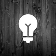 a light bulb with the letter y in it on a wooden background photo by gettypimage com