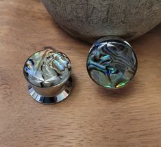 "You will receive a Pair of 316L surgical steel plugs in size 0g 8mm. Plugs have colorful abalone shell inlay. 3/8\" wearable length Screw Fit for easy on and off - no o-rings to deal with. Great look for guys or girls! High quality, 316L surgical steel plugs are very safe for stretching ears.  **Hypoallergenic** --Great gift for a friend or yourself! If you want me to include a FREE gift bag, just select the gift message option when you check out." Stretching Ears, Ear Stretching, 00 Gauge, Gauge Earrings, Organic Wood, Tunnels And Plugs, Gauged Earrings, Ear Gauges, Plugs Earrings