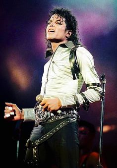 michael jackson performing on stage at an event