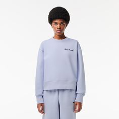 This sweatshirt combines a contemporary cut with double-face piqué fabric. Featuring a ribbed collar and comfortable, sporty styling, topped off with iconic René Lacoste embroidery. Sporty Loungewear Sweater With Ribbed Collar, Sporty Sweater With Ribbed Neckline For Spring, Casual Spring Sweatshirt With Ribbed Waistband, Modern Fall Sweatshirt For Loungewear, Sporty Logo Sweatshirt For Loungewear, Sporty Sweatshirt With Logo For Loungewear, College Sweatshirt With Logo For Fall, Modern Sweatshirt With Ribbed Cuffs For Streetwear, College Logo Sweatshirt For Fall