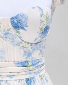 🦋 The Budding Romance Dress 🦋 Enchantingly lovely, this linen blend style might just be our favorite spring dress! Featuring a structured corset-style bodice and a beautiful blue and white floral print, this dress is sure to stun at your next event! Spring Blue Corset Dress With Boned Bodice, Spring Floral Embroidered Corset Dress With Fitted Bodice, Blue Floral Corset Dress, Fitted Blue Spring Corset, Blue Floral Corset Top, Blue Linen Dress, Blue Corset, Corset Style, Spring Dress