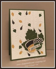 a handmade card with leaves on it