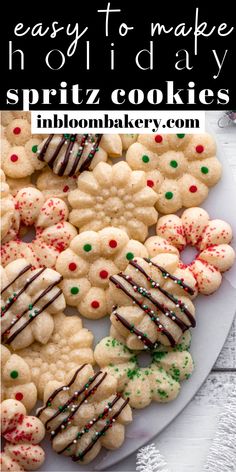 cookies are arranged on a white plate with the words easy to make holiday spritz cookies