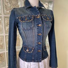 Trendy Bisou Bisou Jean Jacket With Studded And Crystals Embellished At Front And Back Of The Jacket. Size X-Small, Jean Fabric Is Stretchy. Sleeves Are 23” Long, Length Of Jacket Is 19.5” Long, Bust Is 36” Wide. Fitted Long Sleeve Denim Jacket With Snap Buttons, Embellished Fitted Denim Jacket, Fitted Blue Embellished Outerwear, Blue Embellished Fitted Outerwear, Fitted Winter Denim Jacket With Snap Buttons, Fitted Denim Jacket With Snap Buttons For Winter, Jean Fabric, Jeans Fabric, Long Length