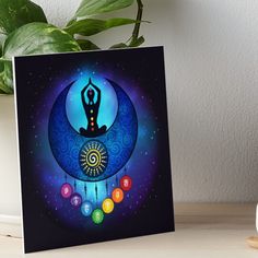 a painting of a woman doing yoga on the moon with seven chakras art board print