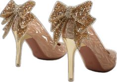 Gold Heels With Bow For Evening, Glamorous Gold Heels With Bow, Gold Heels With Bow For Party, Gold Party Heels With Bow, Elegant Evening Shoe Clips With Bow, Gold High Heels With Bow, Gold Heels With Bow And Round Toe, Glamorous Gold Shoe Clips For Party, Elegant Gold Shoe Clips For Party