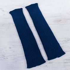 These alpaca leg warmers are designed to accessorize with style and warmth during those cold winter months. Maritza Oviedo selects navy blue for the design of these versatile leg warmers. They are knitted with baby alpaca a term reserved for the first wool of the shearing season which is softer. Blue Fitted Casual Leg Warmers, Casual Fitted Blue Leg Warmers, Blue One-size Leg Warmers For Fall, Blue Fitted Leg Warmers For Fall, Blue Fitted Leg Warmers For Winter, Fitted Blue Leg Warmers For Winter, Cozy Blue Leg Warmers For Winter, Knitted Blue Leg Warmers For Winter, Blue Knitted Leg Warmers For Winter