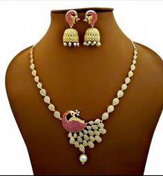 Beautiful premium necklace set with gold plated Peacock design with ad stones and pink stones on the peacock ,comes with matching jhumki for a party wear Pink Stones, Chandler Az, The Peacock, Peacock Design, American Diamond, Pink Stone, Balloon Decorations, Little Gifts, Crystal Necklace