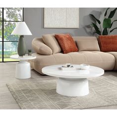 Product Features Include：Coffee Table *1 Color: Engineering Marble & White High Gloss Finish Materials: Metal, Composite Wood, Engineering Marble Catalog Size: 40"Dia x 14"H Assembly Required: Yes Step into a world of serenity with this stunning Zaid collection table set in a pristine white finish These tables blend seamlessly with any decor, creating a tranquil and sophisticated atmosphere Perfect for both modern and classic interiors, the minimalist design offers a clean and airy feel Whether Wood Engineering, Classic Interiors, Acme Furniture, Coffee Table Setting, Living Room Coffee Table, Classic Interior, Composite Wood, Round Coffee Table, Mudroom Furniture