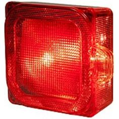 a red light on a white background