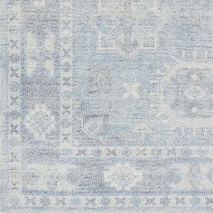 an area rug with blue and white colors