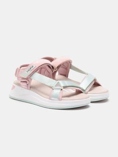 Inspired by the sunsets of MARTINIQUE island. These sandals are designed to be the must-have for sunny days, thanks to the blend of pastel tones in pink and green. Their details and materials in suede, synthetic, and textile not only make them a unique piece but are also synonymous with comfort due to the memory foam insole and padded lining. Perfect for walking and pairing with your favorite jeans or dresses. Remember that these sandals are not made to get wet. Sole height: 5 cm. Playful Pink Beach Sandals, Martinique Island, Pink Cushioned Slip-on Sport Sandals, Pink Slip-on Sandals With Woven Sole, Pink Textured Sole Slip-on Sandals, Multicolor Non-slip Beach Slides, Beach Walk, Under The Stars, Velcro Straps