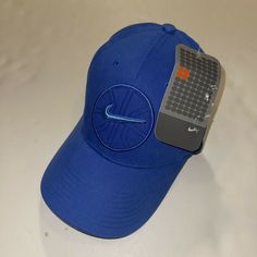 Rare vintage 2000s Nike Baskteball baseball hat BRAND NEW WITH TAGS! Cardboard insert still in the hat Clean blue colorway with Huge embroidered Nike basketball logo on the front DEADSTOCK Nike Baseball Cap With Curved Brim For Sports, Nike Curved Brim Baseball Cap For Sports, Nike Breathable Baseball Cap, Nike Casual Baseball Cap Breathable, Nike Breathable Baseball Cap For Sports, Blue Breathable Baseball Cap For Sports, Blue Breathable Baseball Cap For Sports Events, Nike Breathable Hats For Sports Events, Blue Sporty Baseball Cap For Sports