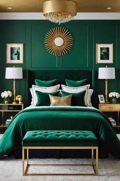 a bedroom with green walls and gold accents