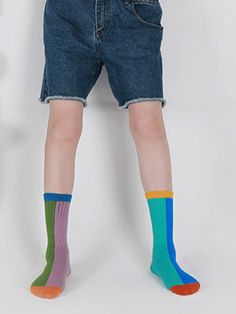 Make a bold statement with our Color Block Asymmetrical Cotton Socks. Featuring a dynamic design of contrasting colors and asymmetrical patterns, these socks add an edgy twist to your outfit. Crafted from soft and breathable cotton, they provide comfort and style all day long. Whether you're pairing them with sneakers for a casual look or dressing up with boots for a night out, these socks are sure to turn heads. Step into fashion-forward style with our Color Block Asymmetrical Cotton Socks! You Trendy Blue Knee-high Socks For Winter, Trendy Multicolor Socks For Spring, Trendy Blue Socks For Winter, Trendy Blue Winter Socks, Trendy Stretch Blue Socks, Trendy Multicolor Stretch Knee-high Socks, Retro Multicolor Cotton Socks, Stretchy Multicolor Trendy Knee-high Socks, Casual Blue Mid-calf Socks