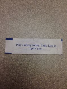 a piece of paper taped to the floor with words on it that say play lotty today lady luck is upon you